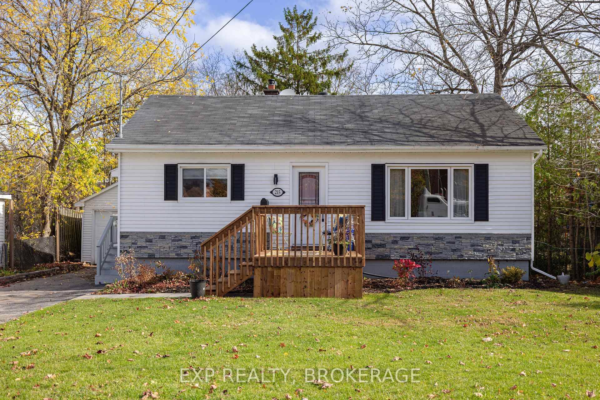 Cute, cozy, and completely move in ready this 2 bedroom plus den, 1 bath bungalow with detached garage and a fenced yard is full of charm, comfort and convenience.