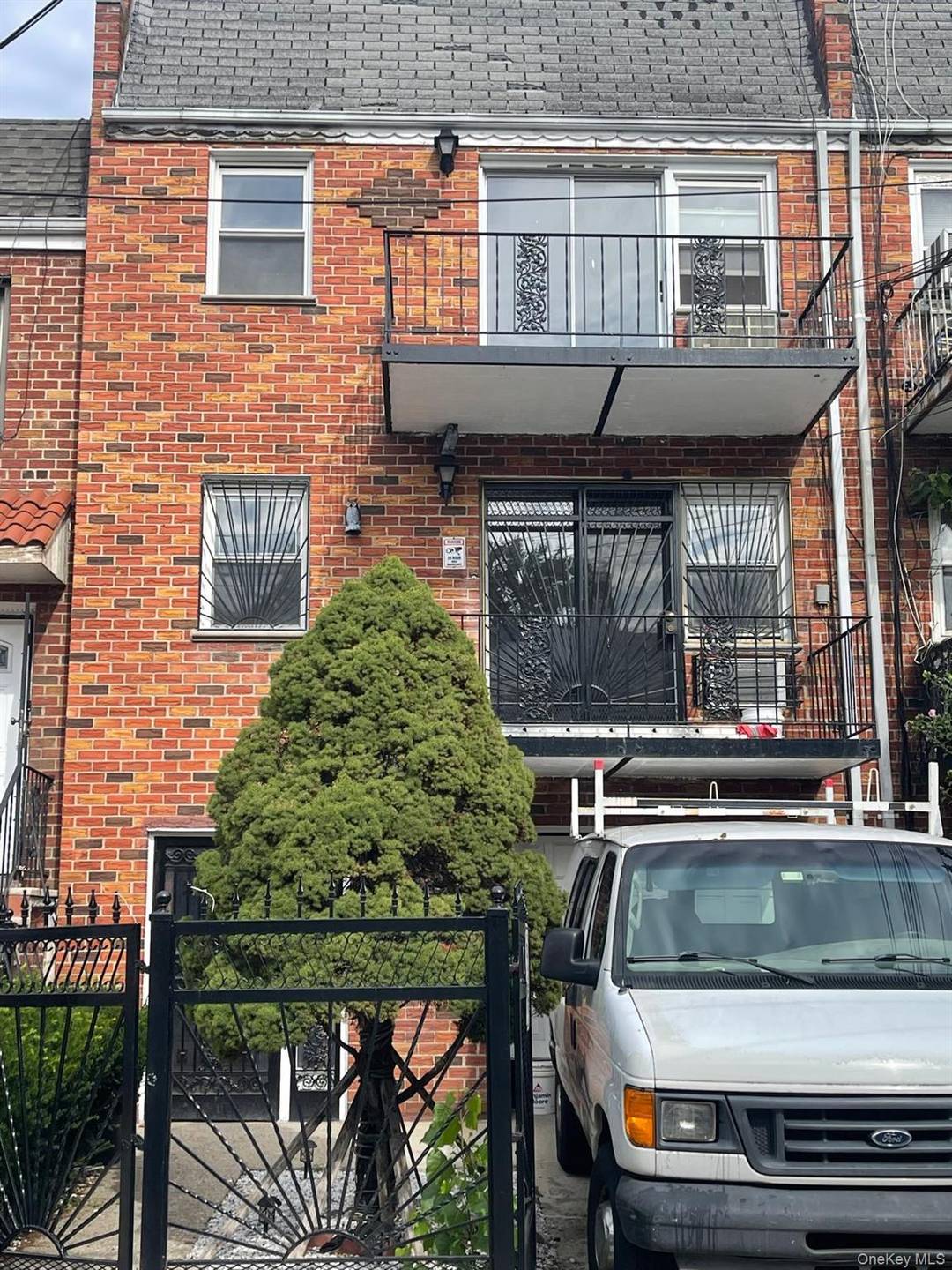 Solid brick two family home located in the heart of Corona.