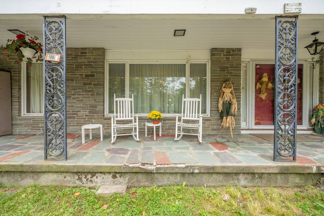 Welcome to this distinctive property showcasing a grand open foyer with front and back staircases.