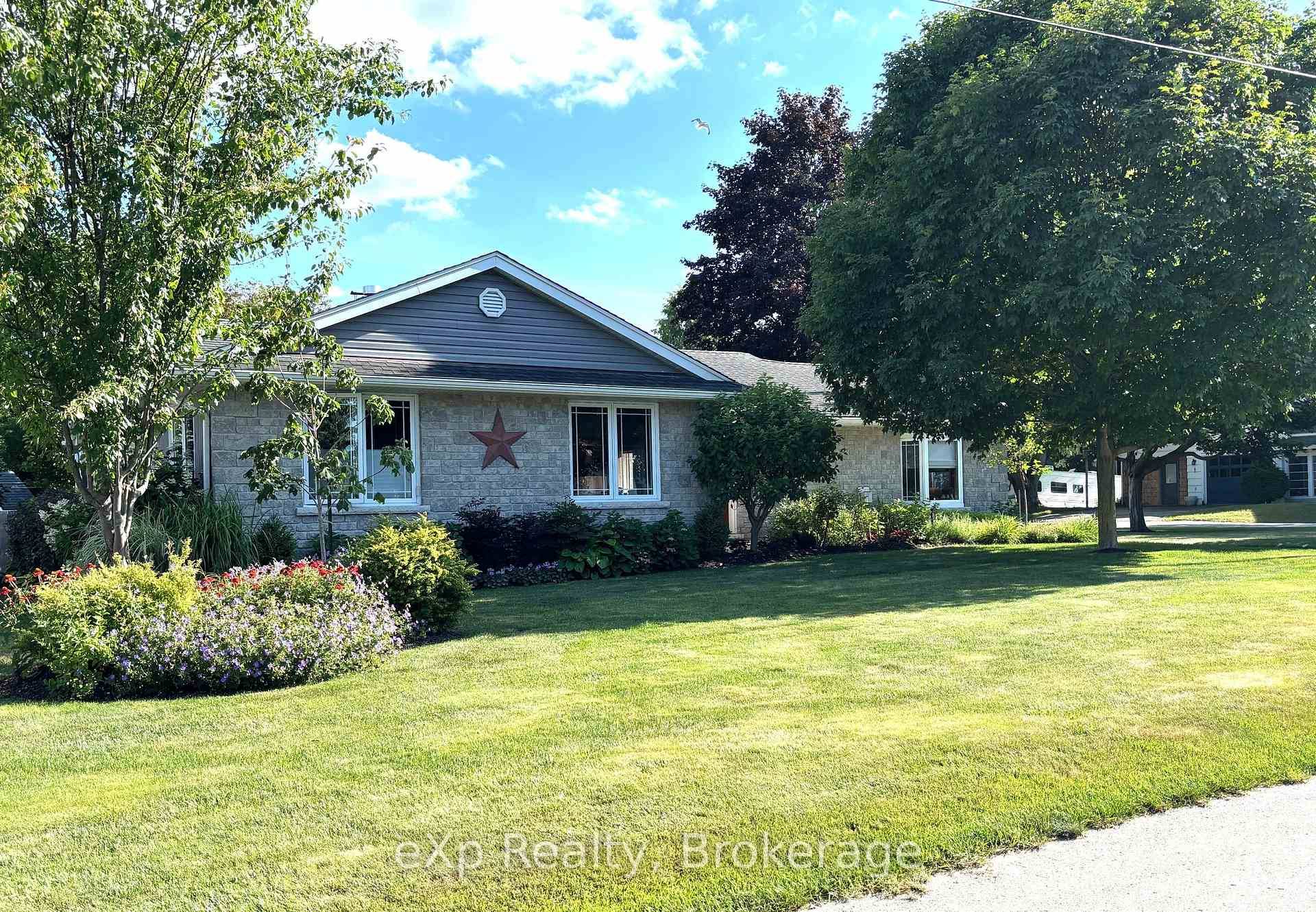 This exquisite four bedroom, family bungalow situated in a quiet and desired area of town showcases a unique blend of style and elegance, offering over 4, 000 square feet of ...