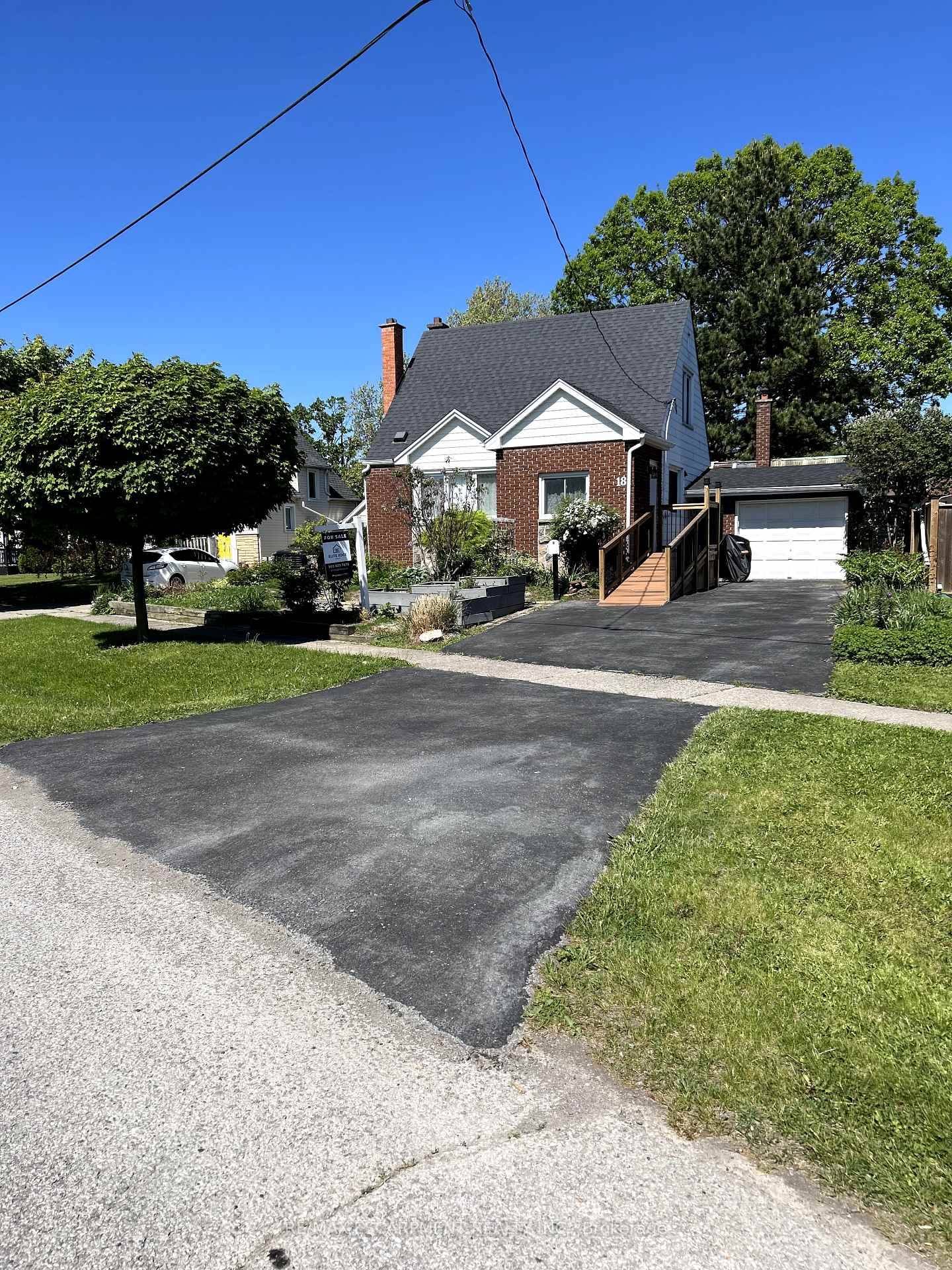 Beautiful amp ; fully renovated detached home with attached garage !