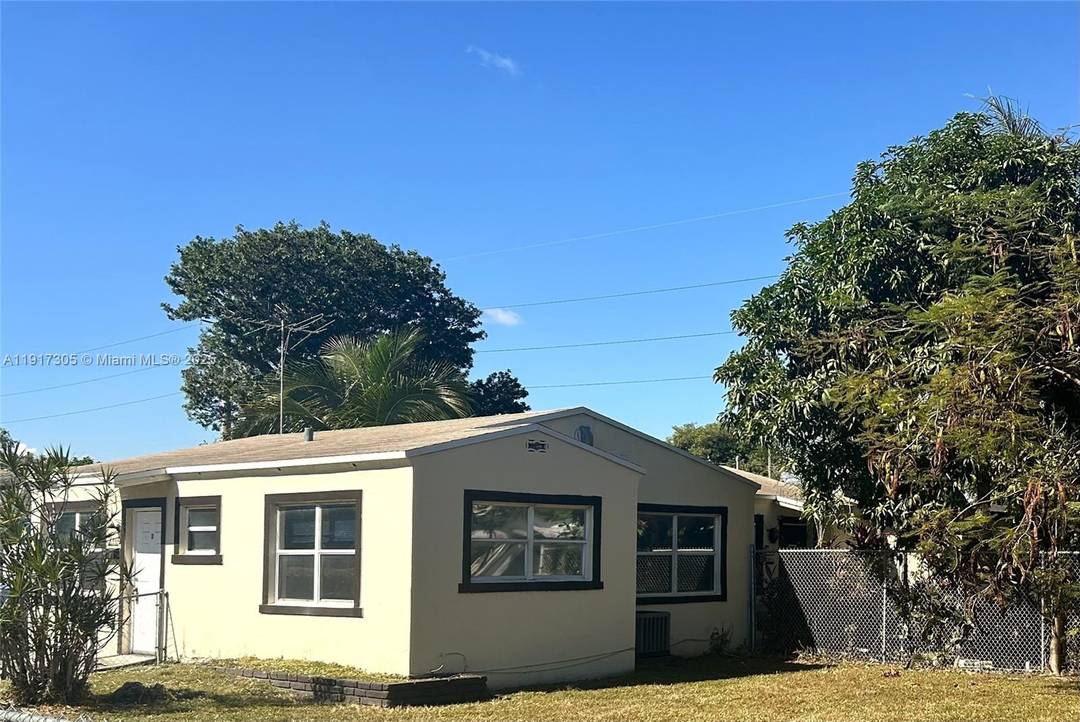 Discover an incredible investment opportunity with this Hollywood duplex on a prime corner lot just minutes from I 95.