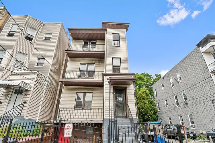 Three bedroom, one bath apartment on the second floor of a multifamily house in the Nodine Hill section on Yonkers.