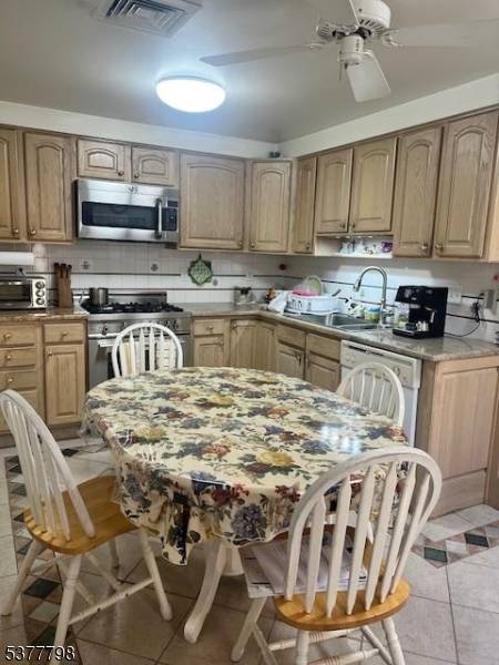 BEAUTIFUL 4 BEDROOM AND 3 FULL BATH COLONIAL, VERY SPACIOUS LARGE ROOMS, HARDWOOD FLOORS THROUGHT OUT, KIT GRANITE COUNTER TOPS, TWO ZONE A C, TWO CAR GARAGE, MUST SEE !