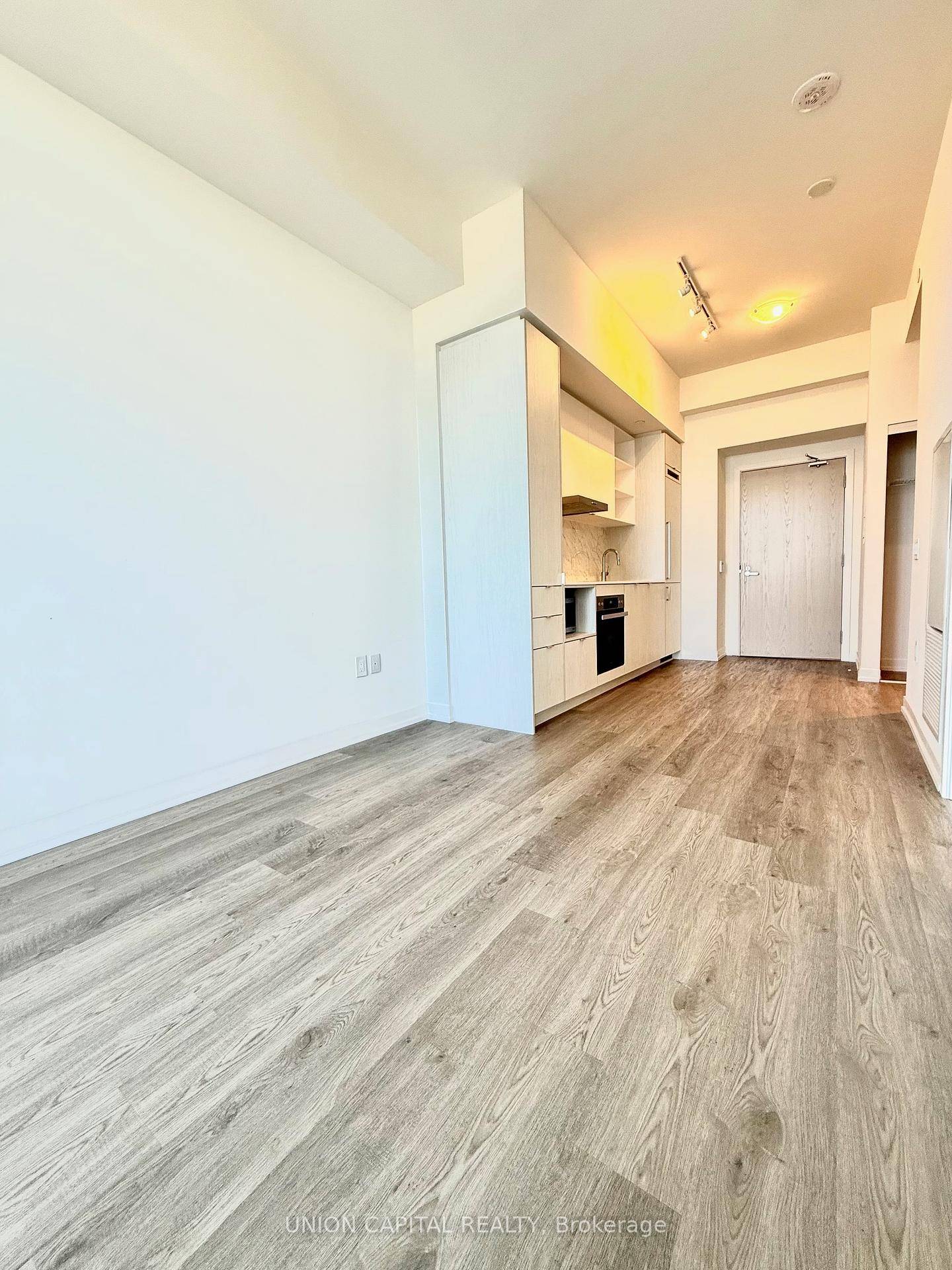 Experience unparalleled luxury living in this stunning 1 bed, 1 bath condo perched on the 70th floor of the iconic Sugar Wharf Condo by Menkes.