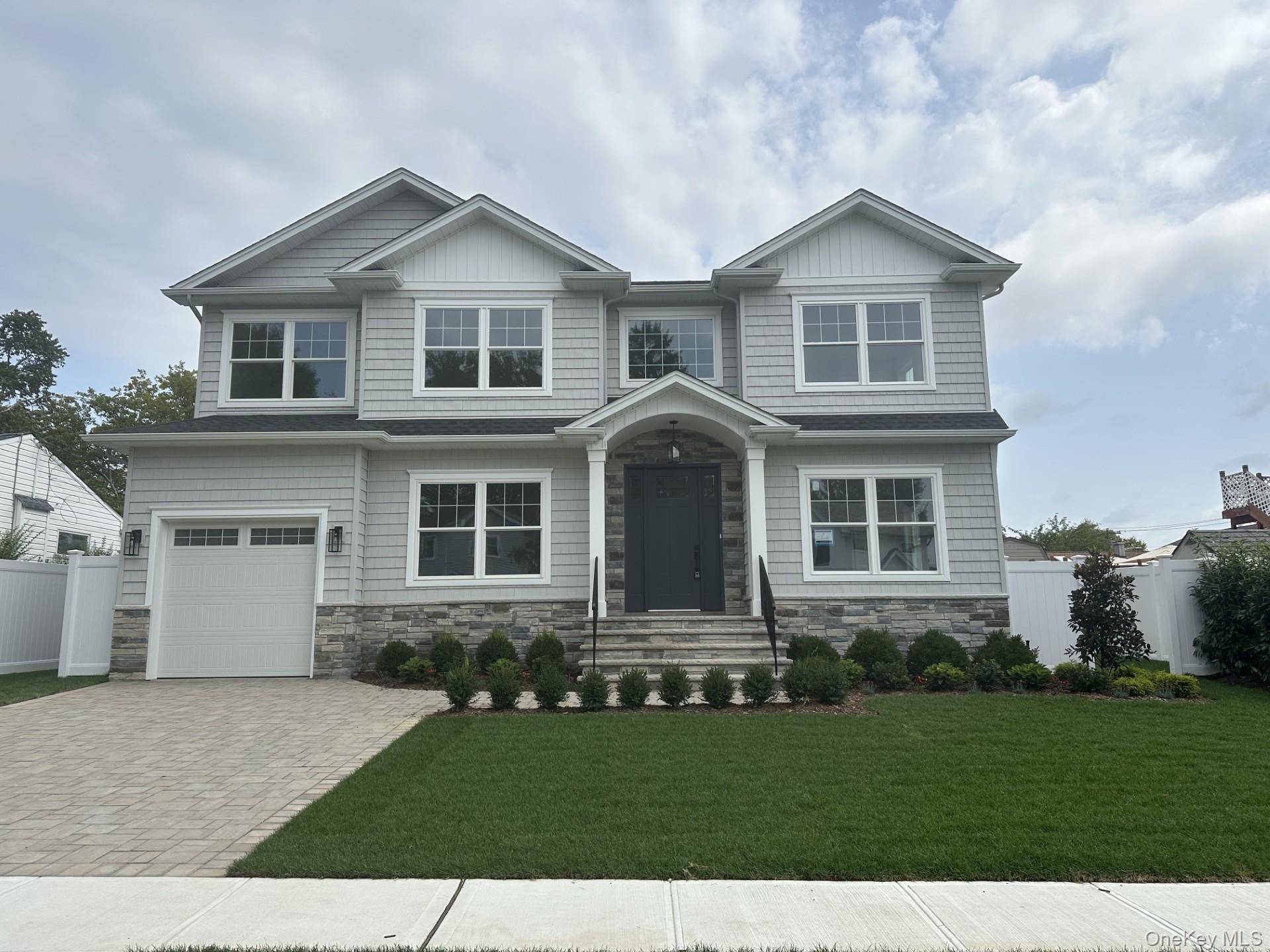HOUSE IS 99 COMPLETE ! ! Brand New Construction in Prime Plainview Location !