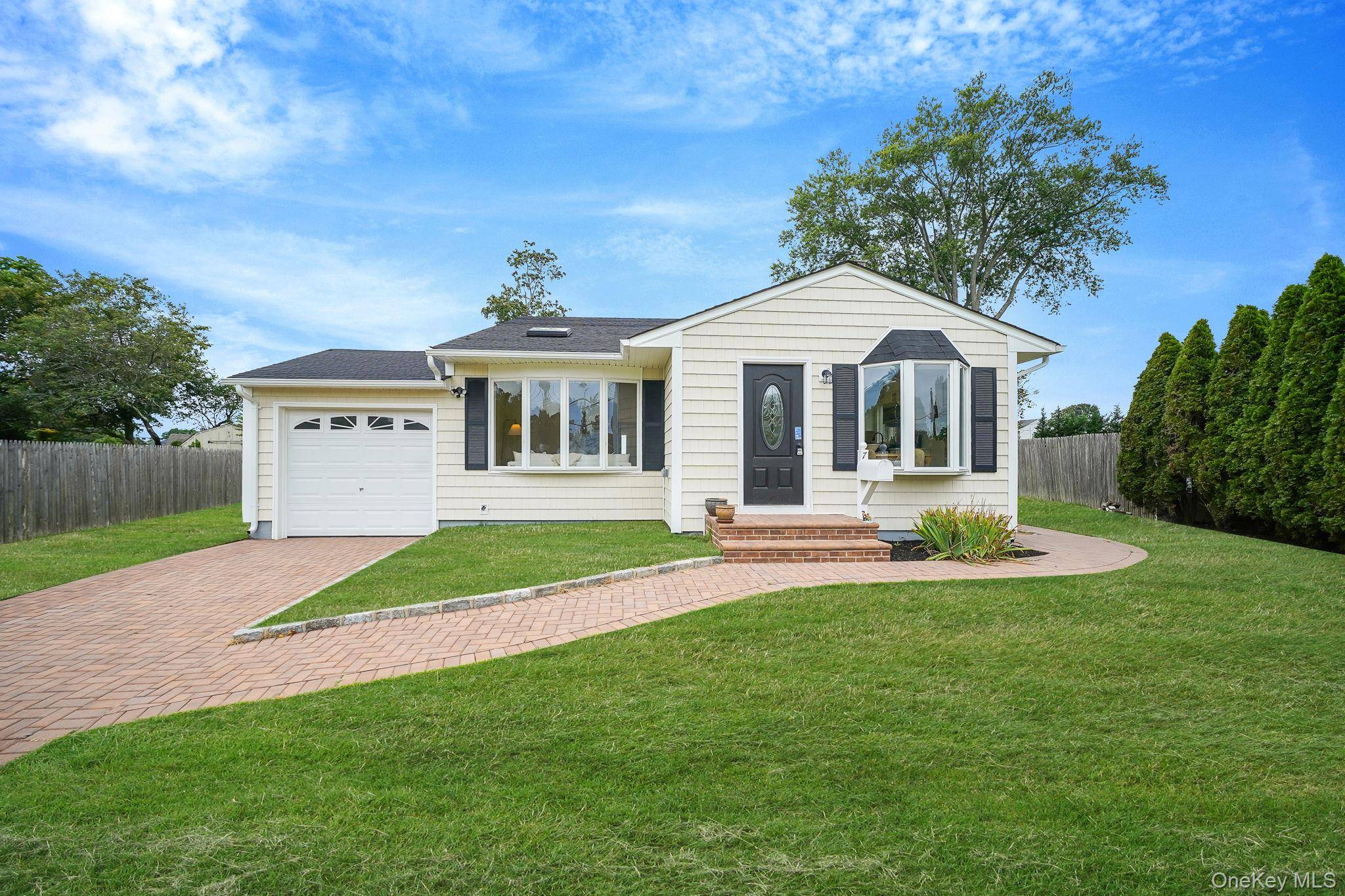Move right into this beautifully renovated 3 bedroom, 2 bath front to back split in the heart of Kings Park.