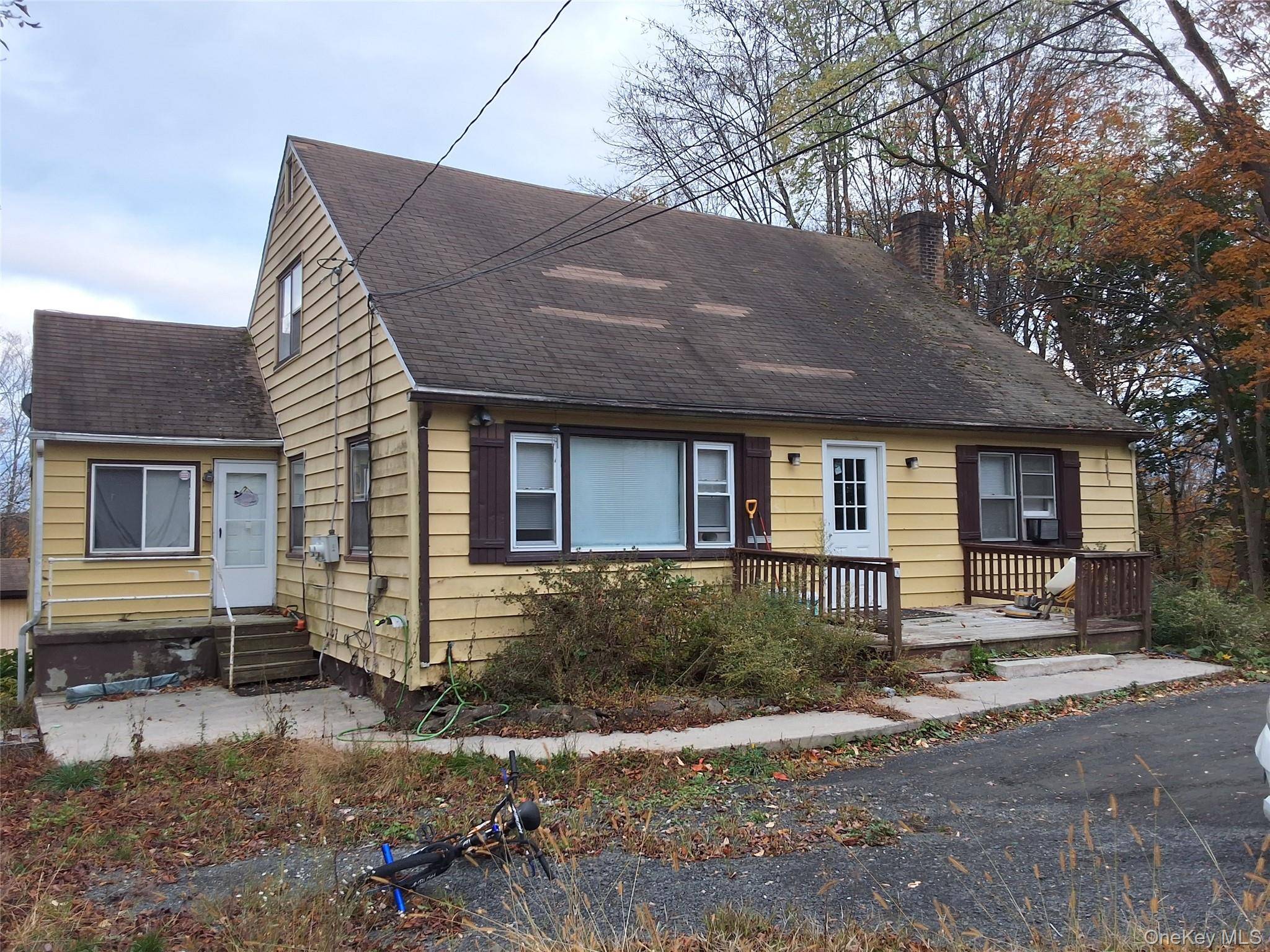Welcome to 84 North Road, a charming Cape Cod style triplex located in the heart of Bloomingburg.