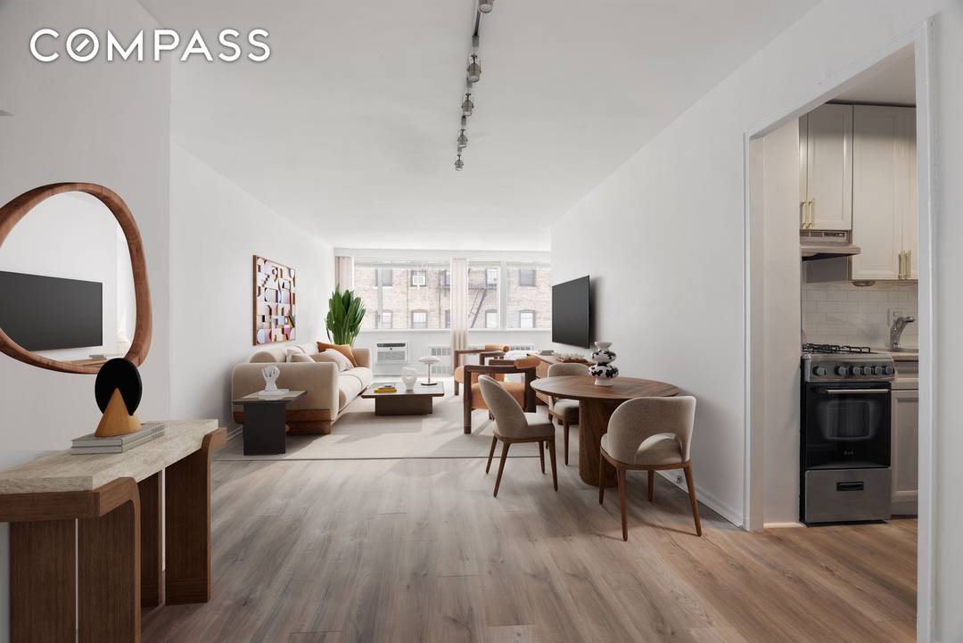 This thoughtfully designed alcove studio offers a highly functional layout, ideal for maximizing both style and space.