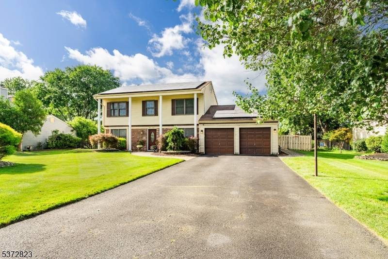 Welcome to 59 Newport Drive, Manalapan.
