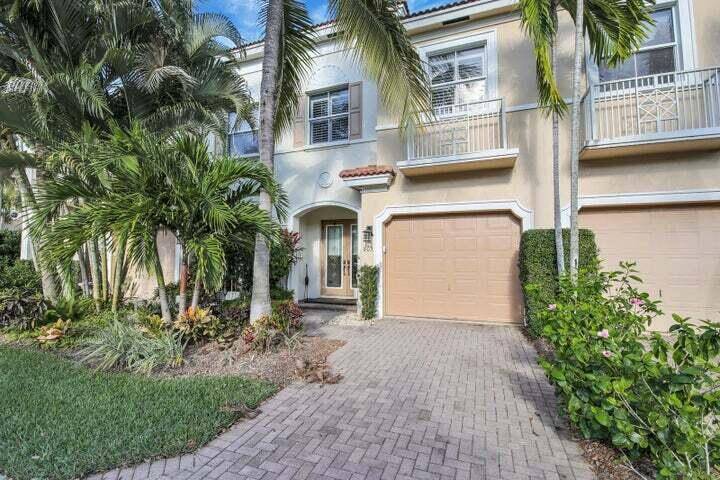 Welcome to Paradise ! You can not beat the Location of this Beautiful Townhome within the Premier Gated community of Jupiter Harbour.