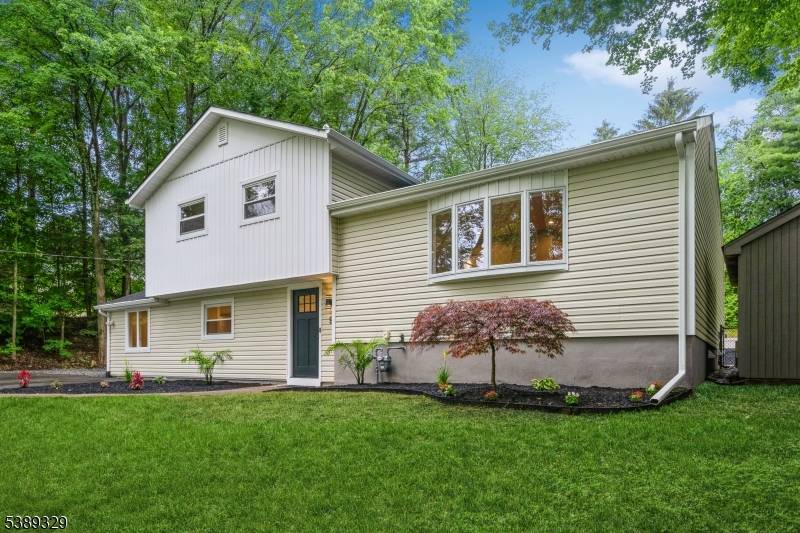 Welcome to this oversized split level home in the heart of West Milford, boasting a modern feel with fully renovated interior and exterior.