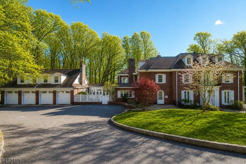 Set within the storied gates of Llewellyn Park, 5 Rocky Way offers a rare blend of privacy, scale, and timeless elegance on a wooded, secluded lot with a quiet, serene ...