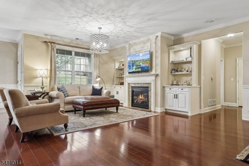 Stunning, beautifully upgraded Gardenia model with two spacious bedrooms and two bathrooms conveniently located on the first floor of this favorite over 55 condo association.