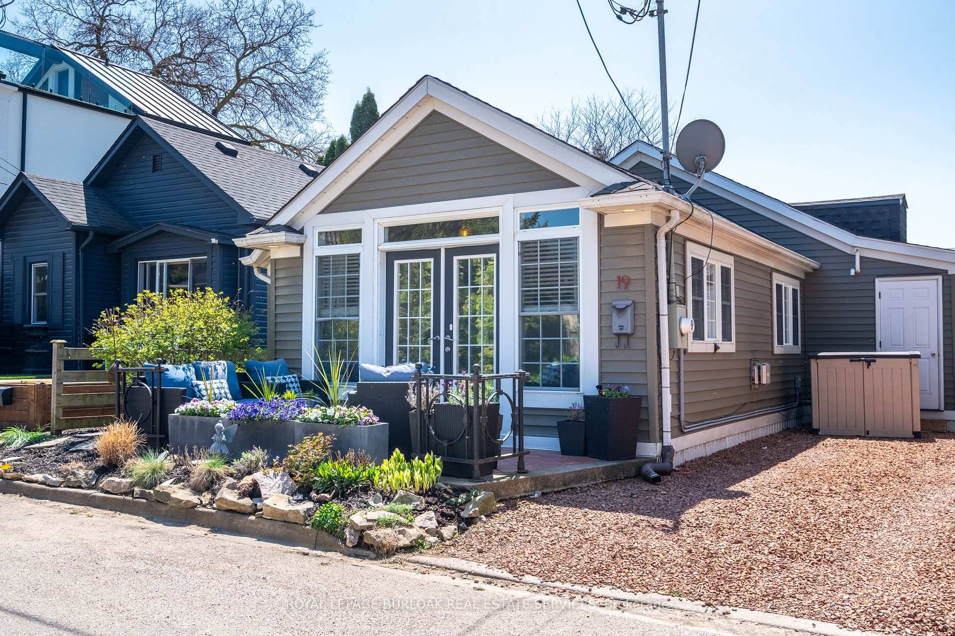 Better than condo living, this charming bungalow offers relaxed, single floor living with stunning lake views right from your front porch.