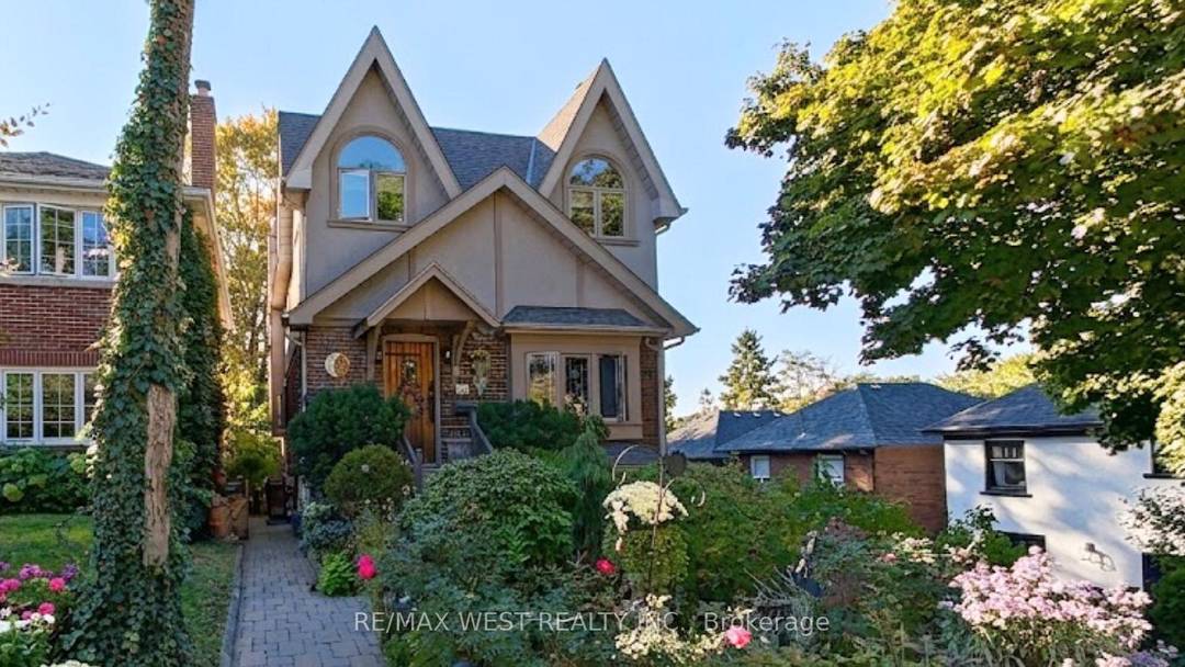 Charming Tudor inspired home on a quiet street just steps to renowned Bloor West Village !