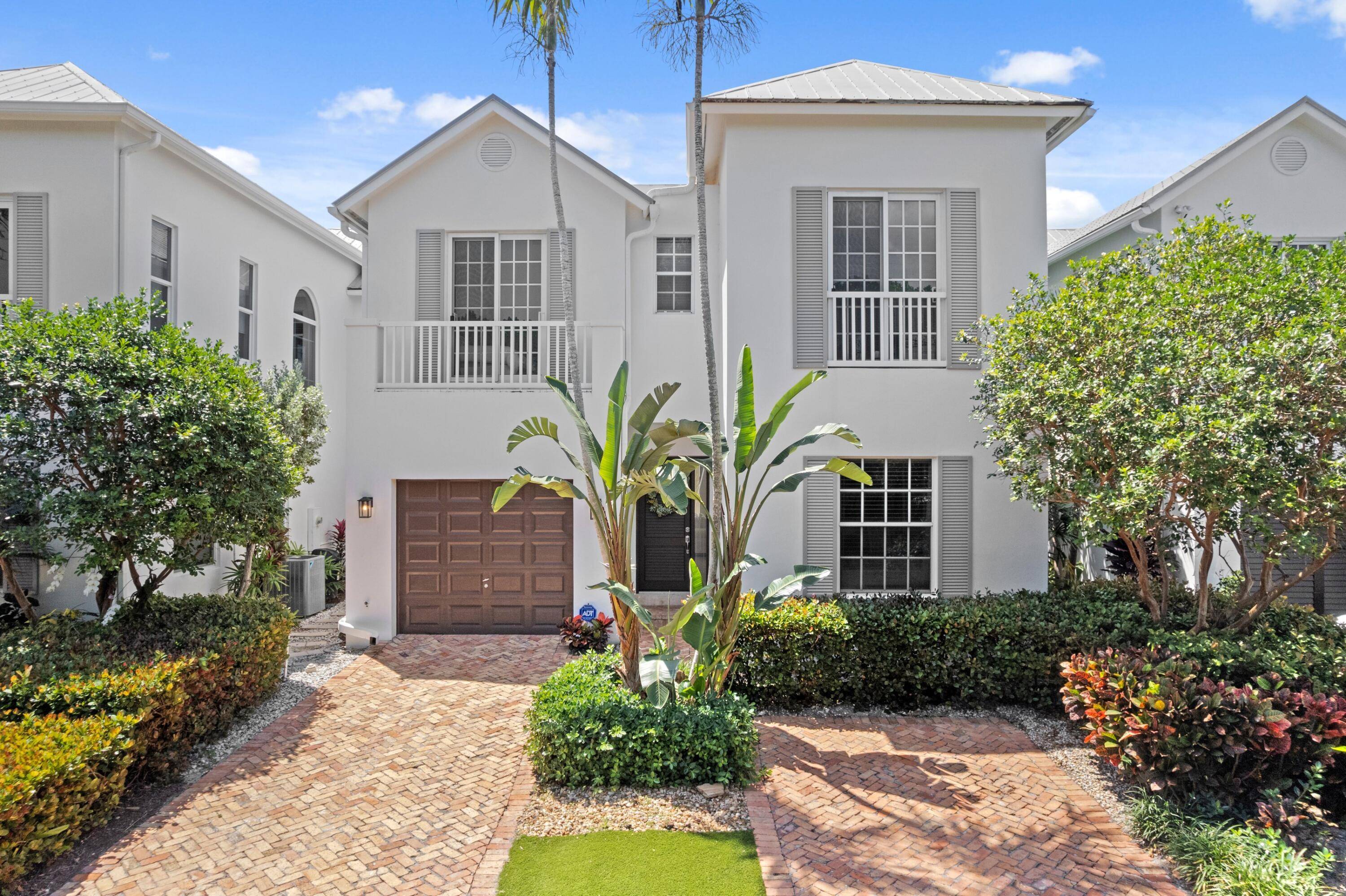 Discover the Charm and Sophistication of This Boutique Beach Area Townhome.