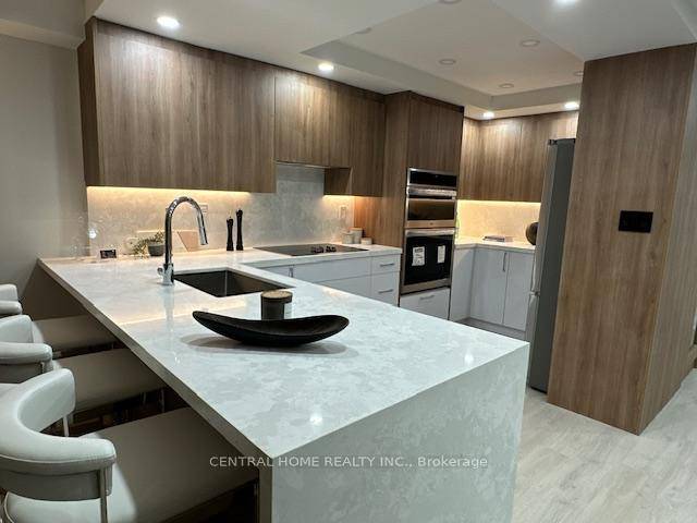 An exceptional and luxurious renovated apartment in a Tridel built high rise.