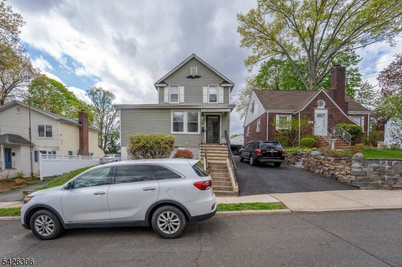 Discover this charming one family home, a spacious 5 bedroom, 2 bath residence offered at 620, 000.