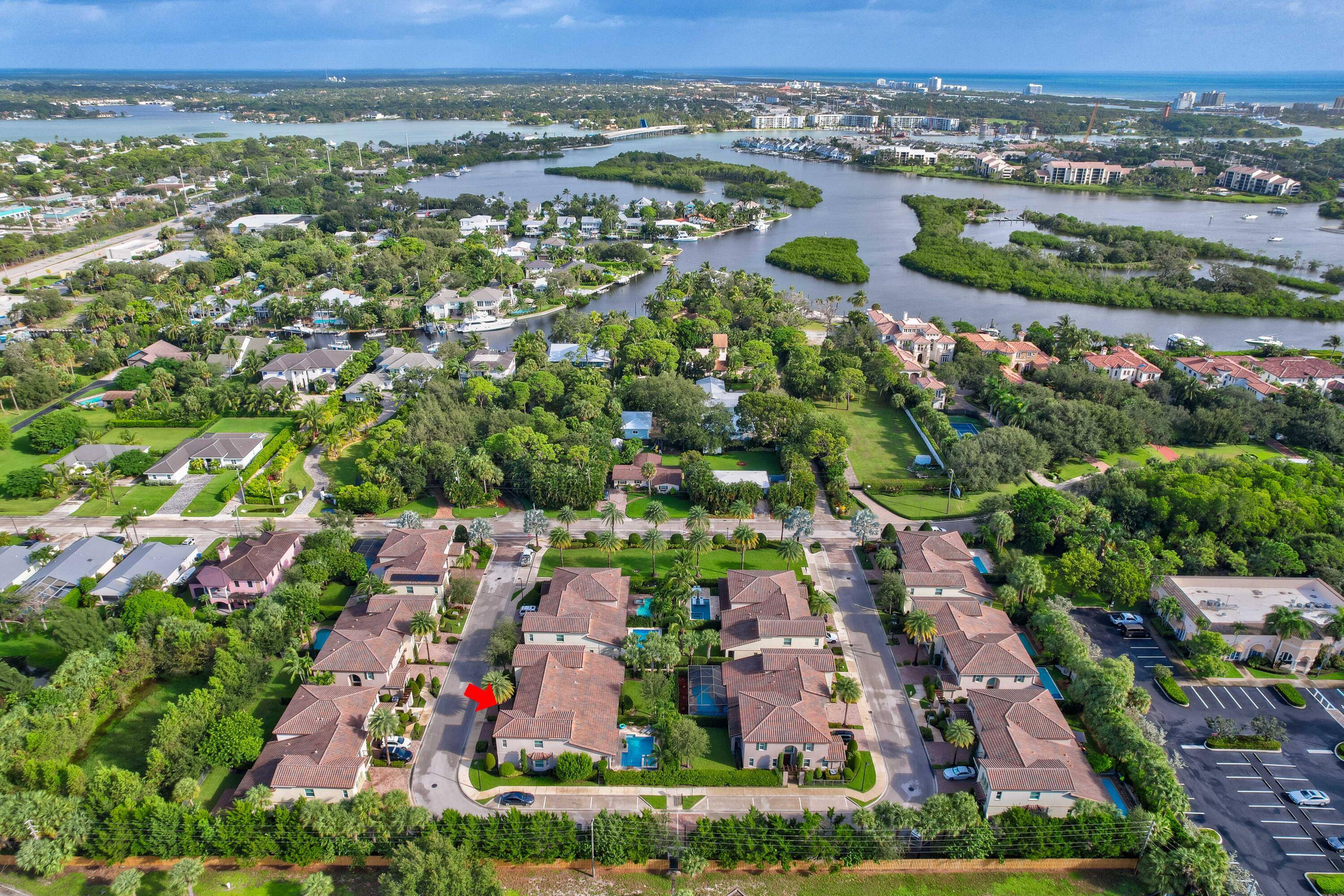 Spectacular modern townhouse in a quiet neighborhood, located in a top rated Jupiter school zone and just 1.