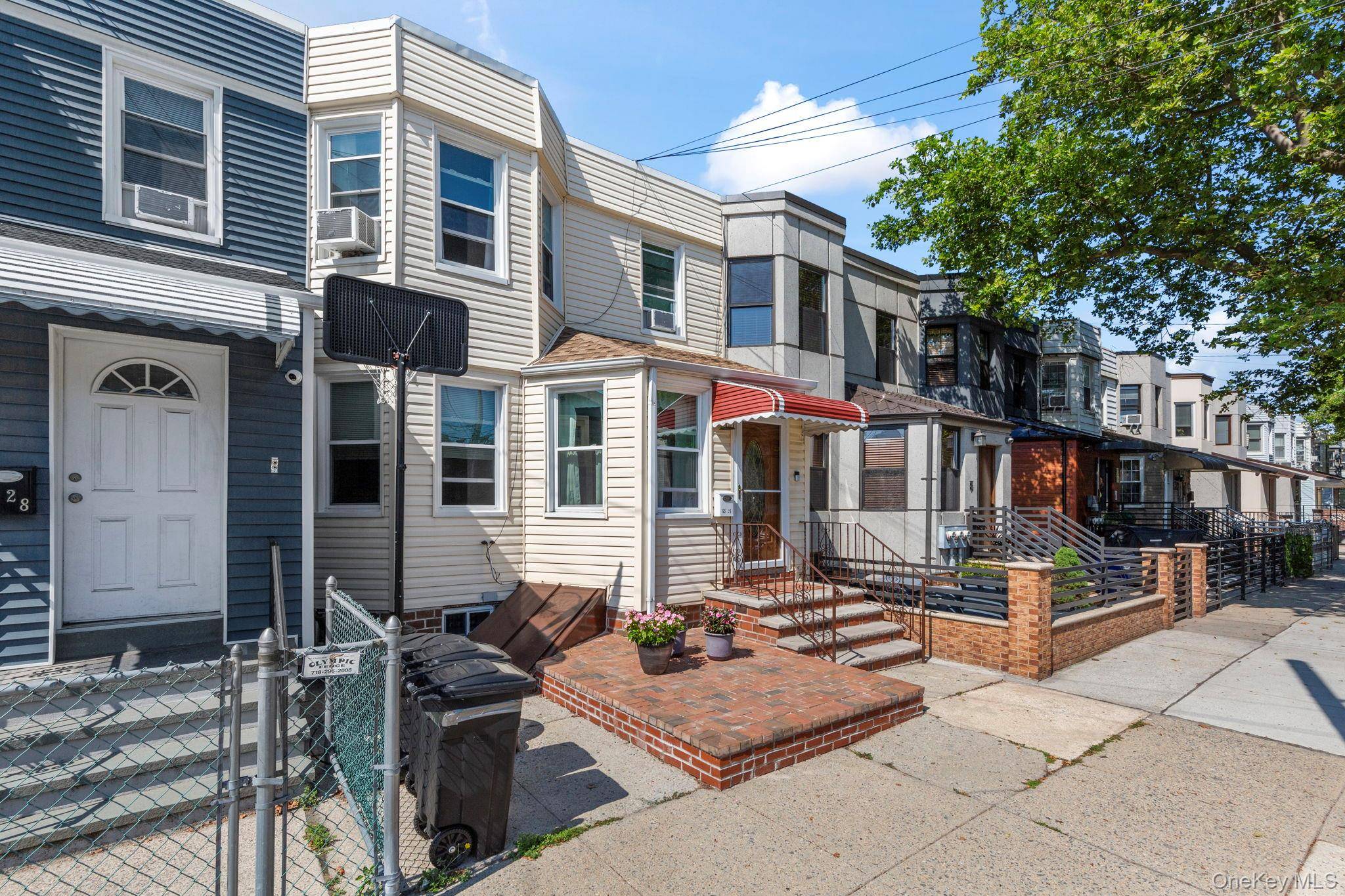 Two Family Duplex In The Heart Of Middle Village Offering A Total Of Five Bedrooms And Three Bathrooms.