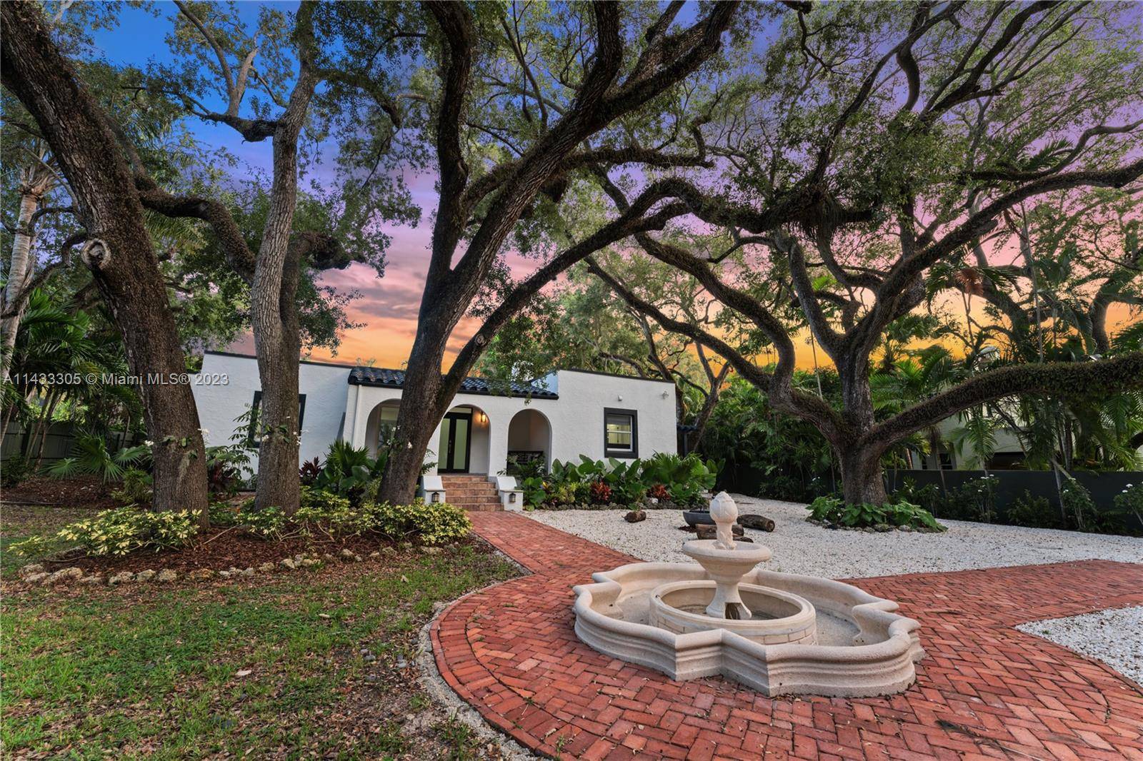 Step into the charm of this Mid Century Modern gem nestled in the heart of picturesque Coconut Grove.