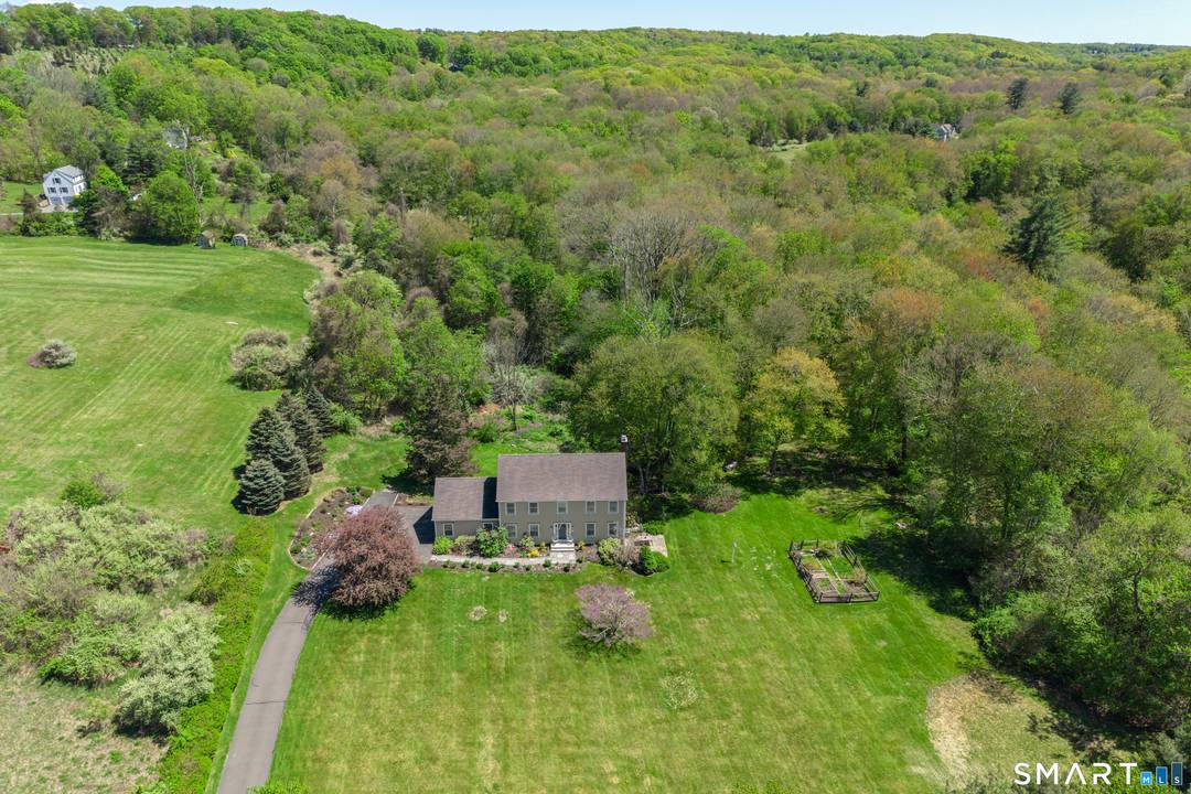 Tucked away off a quiet road on the outskirts of Newtown, this late 90s Colonial offers a masterclass in private living on over four picturesque acres.