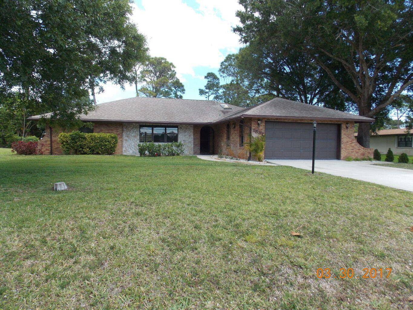 Incredible brick home with over 1900 sq ft living space on a huge half acre lot with gorgeous shade trees.