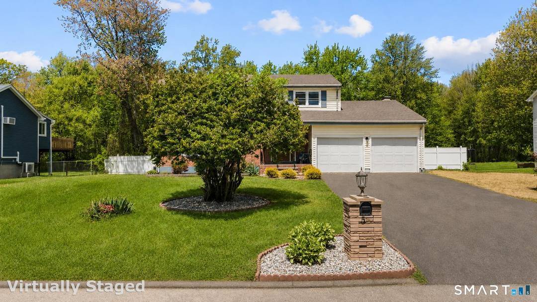 Welcome to 56 Windbrook Drive, where modern style meets comfort in one of Windsor's established residential neighborhoods.