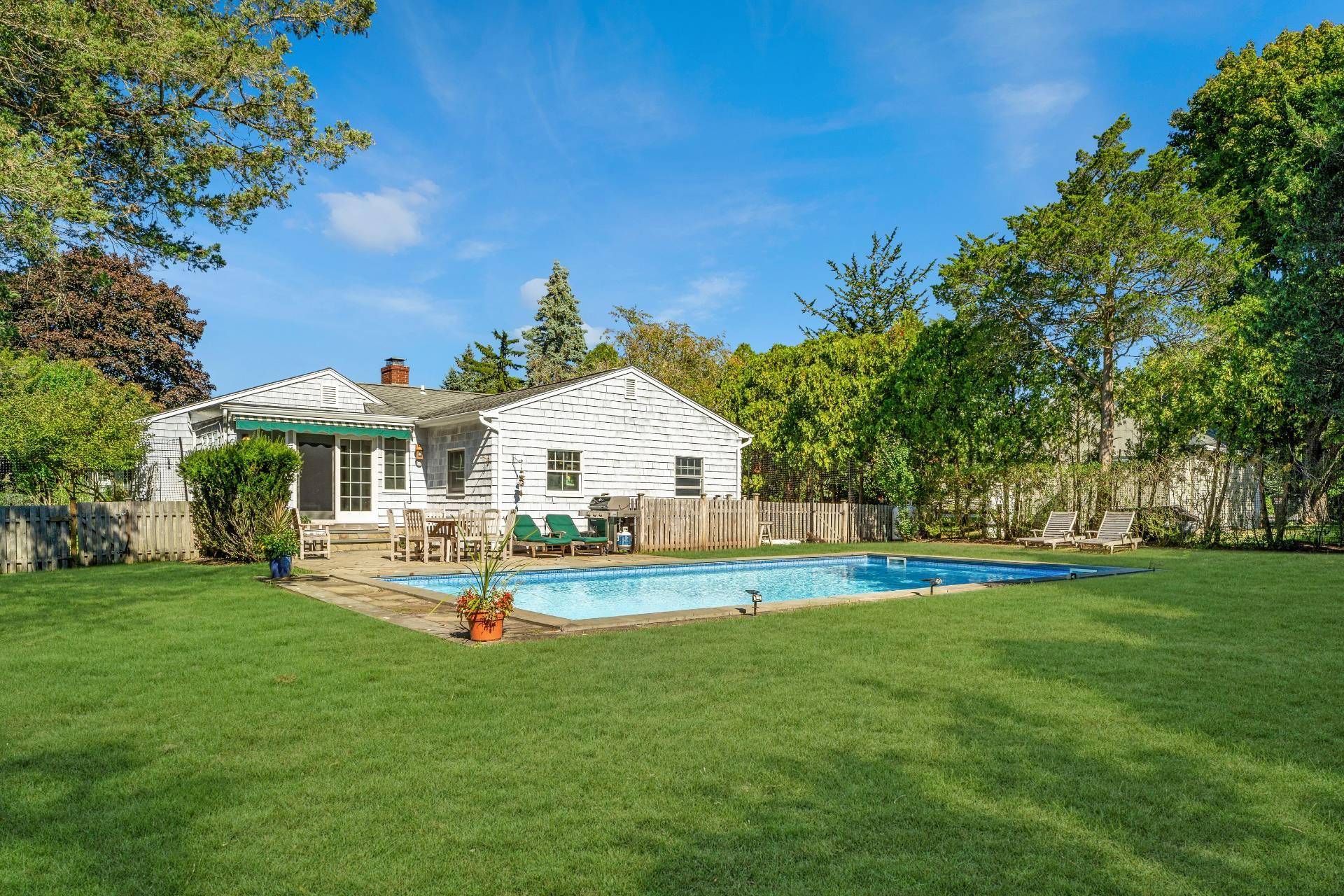 QUOGUE CHARMER Beach House South of the Highway Adorable three bedroom two bath home located south of Quogue Street.