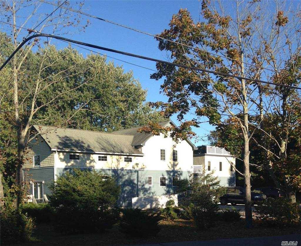This 1200 square foot, 2 story home available as either a summer or annual rental has an open concept kitchen living area and a master suite with a walk in ...