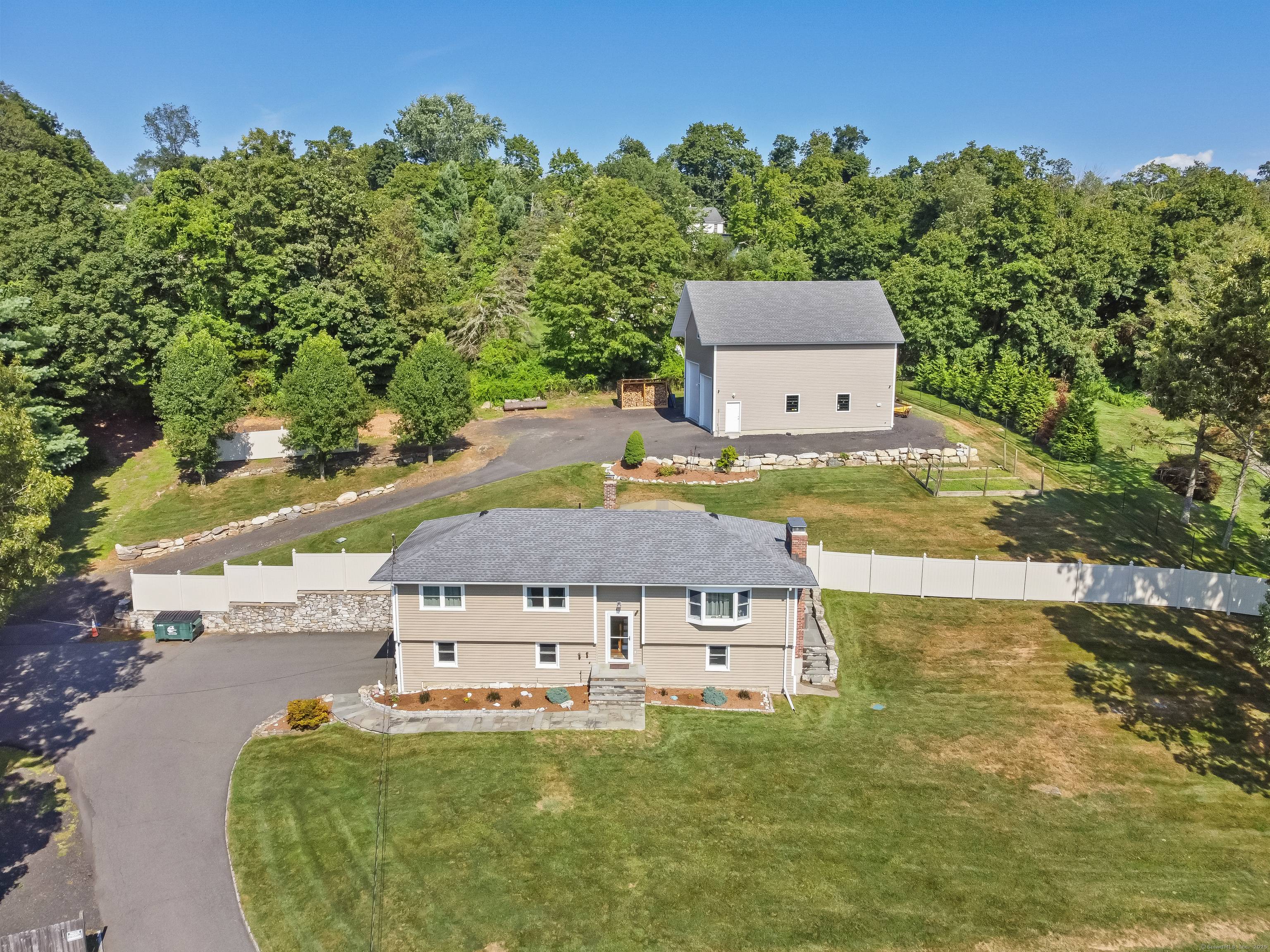 Impressively Upgraded Home with NEW Barn, Fenced Backyard, and Superb Location !