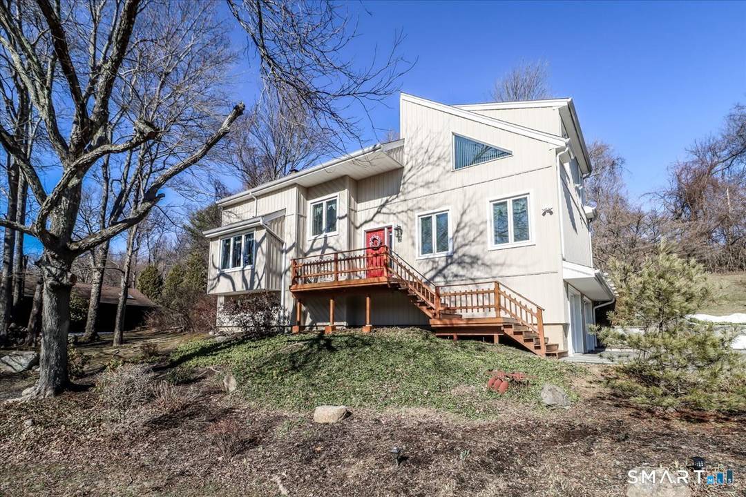 Welcome home ! This stunning West Side Danbury contemporary is ready for you.