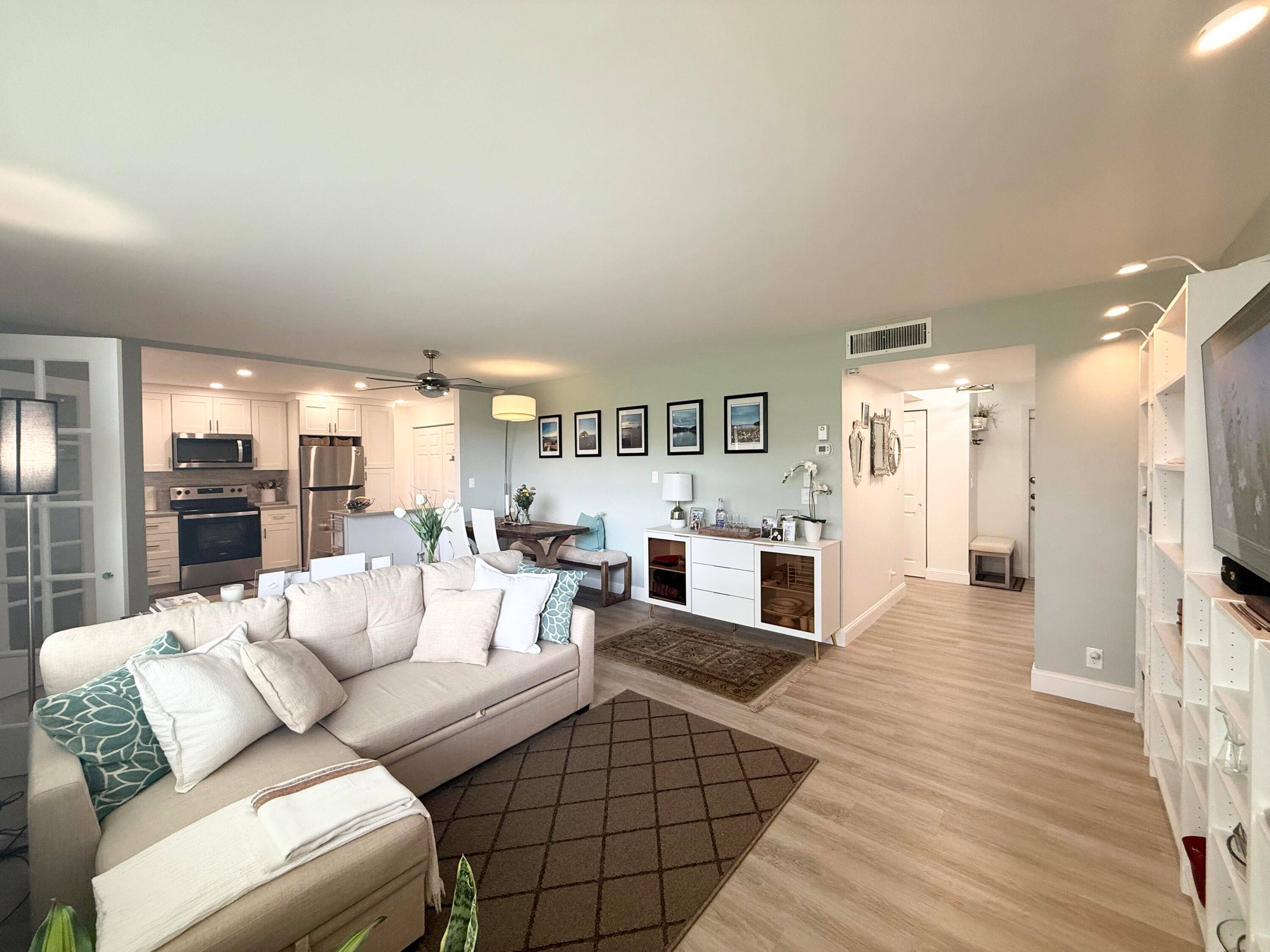 Beautifully Fully Renovated 1 Bedroom, 2 Bath Condo with a Bonus Versatile Enclosed Porch !