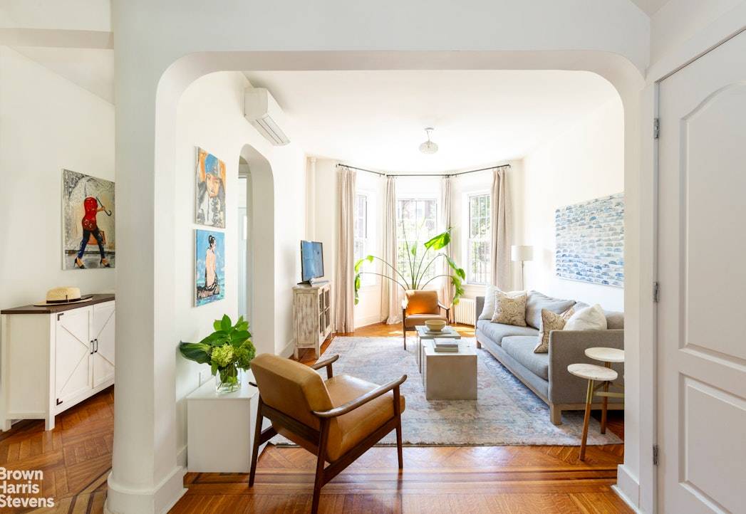 12 Martense Court, a tranquil oasis in the heart of the city, is a perfect blend of modern elegance and classic charm.