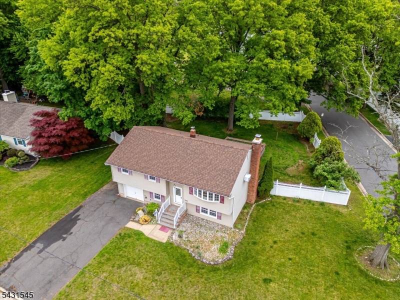 Wow ! Rare opportunity to own a 4 bedroom, 2 bath bilevel home backing directly to Spring Lake Park.