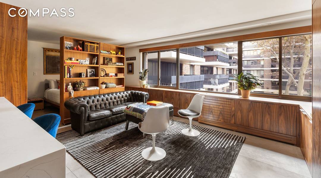 Impeccably designed alcove studio with private courtyard views near South Street Seaport and Financial District.