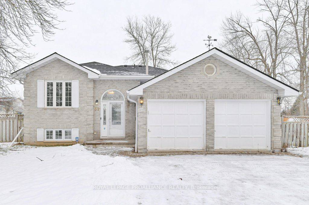 This completely renovated raised bungalow is a haven of modern comfort on a double lot.