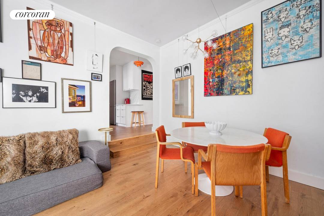 Meticulously renovated with a fresh and modern sensibility, this truly unique top floor three room residence offers tranquility, sunlight, and charm in a coveted Chelsea co op.