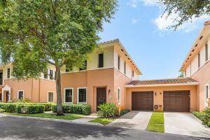 Mediterranean style meets modern living in this move in ready, sun drenched townhome with BRAND NEW ROOF and Gutters !