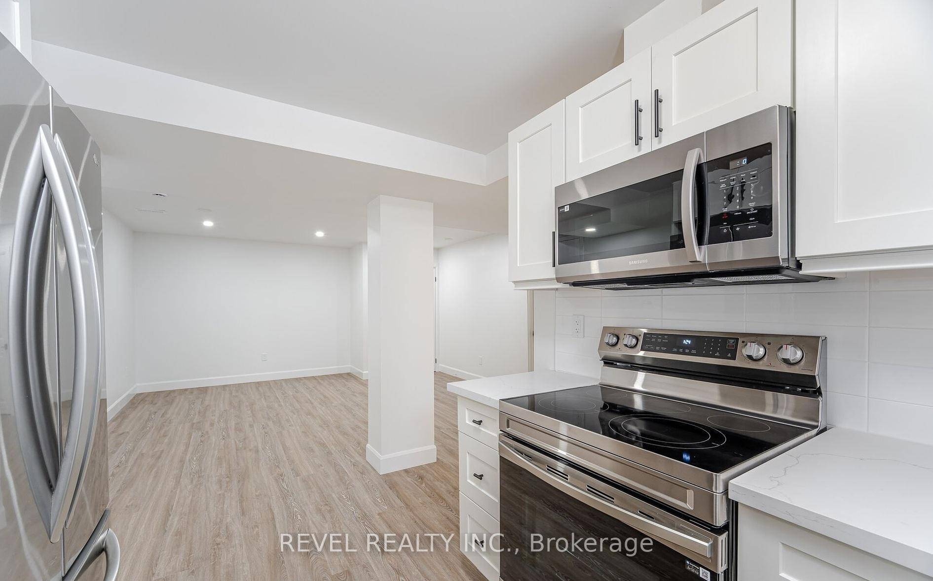 LOWER LEVEL UNIT Brand New, Never Lived with Ensuite Laundry, 8FT CEILINGS, Private Entrance, 2 Large Bedrooms With Windows, 1 Extra Separate Room As a Den, 1 Full Washroom, 2 ...