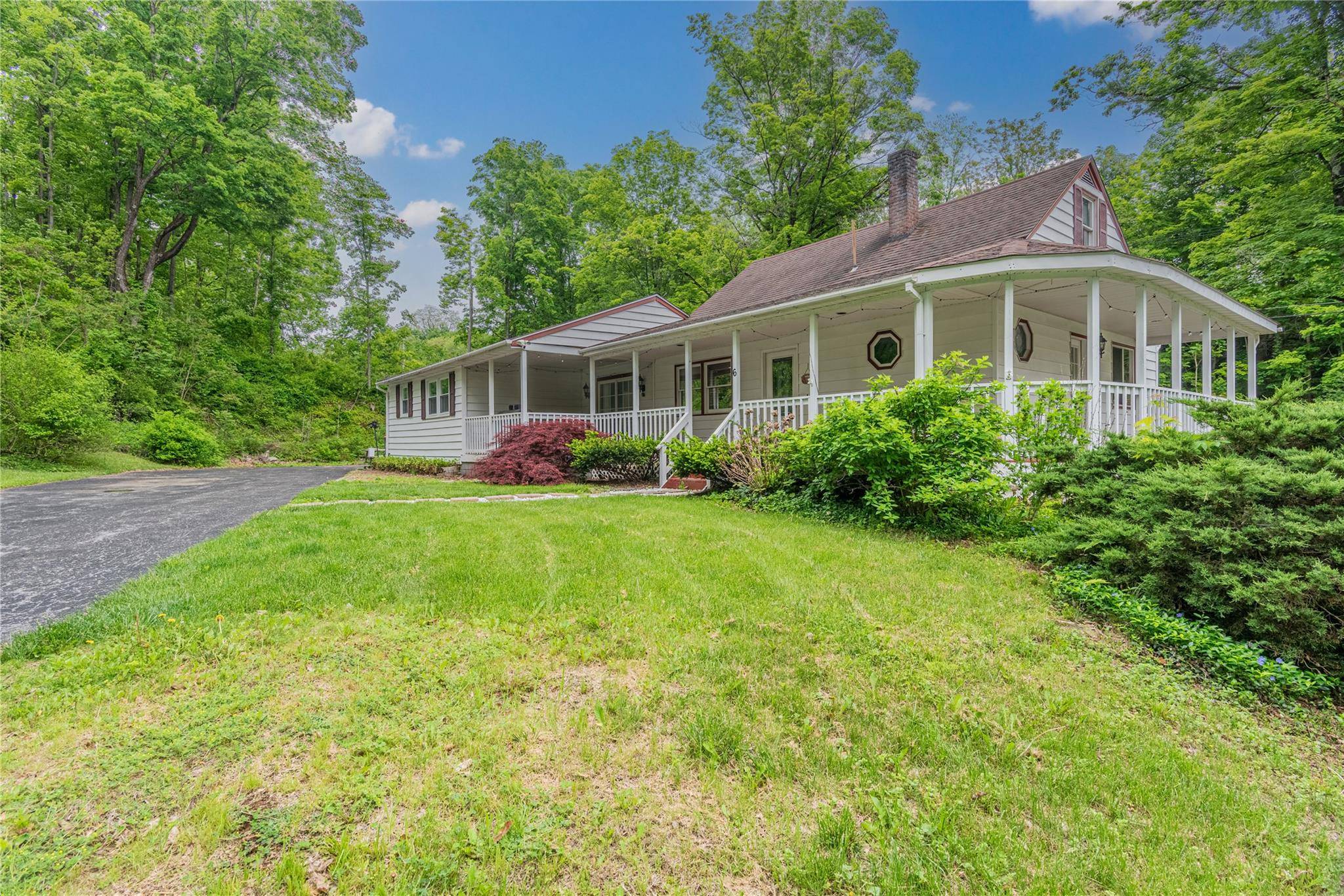 Welcome to 6 Swain Drive, a charming Cape Cod style home nestled in the heart of Pleasant Valley, NY.
