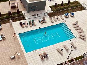 Escape to better at Harbor Point s newest luxury, waterfront residential building.