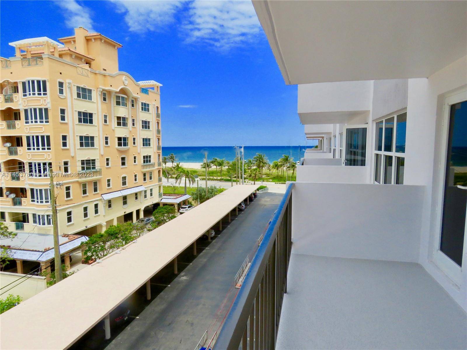 Modern kitchen, stainless steel appliances, granite countertop, contemporary bathrooms, laminated floors.