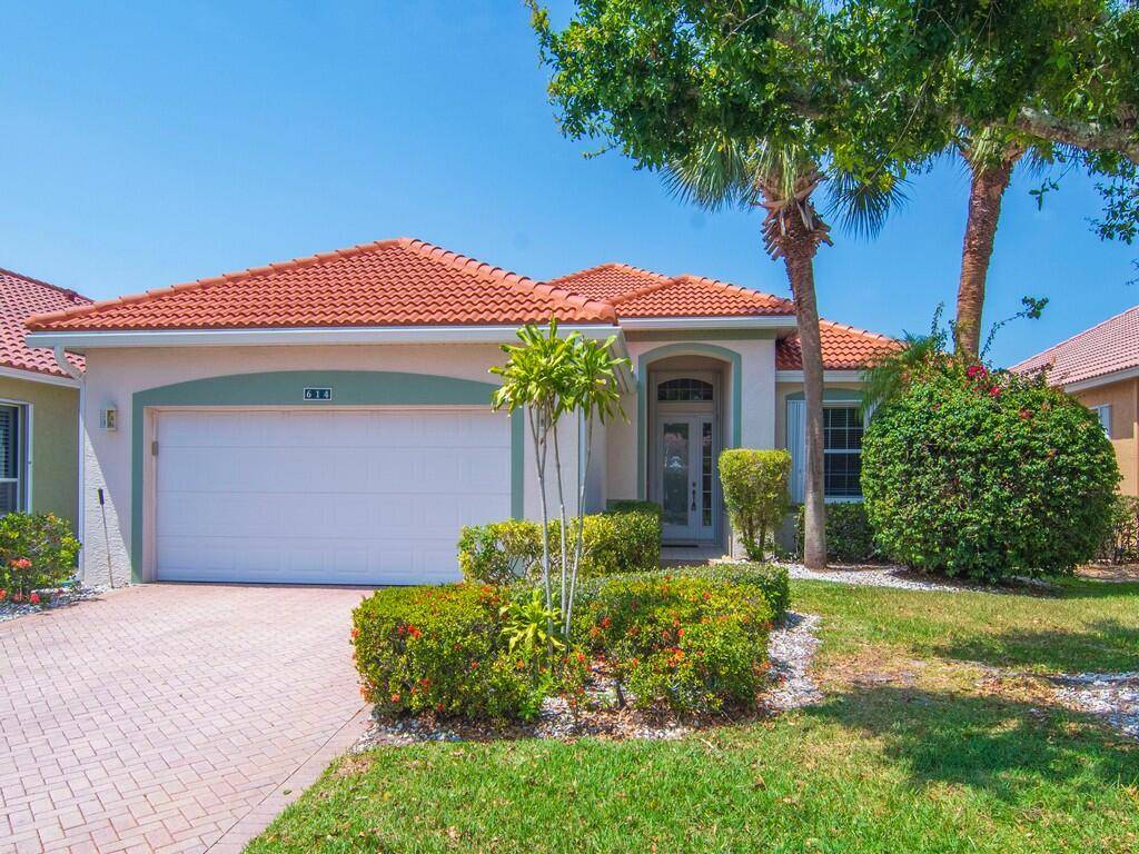 Magnificent Lake View home in the desirable 55 community of Kings Isle in St Lucie West !