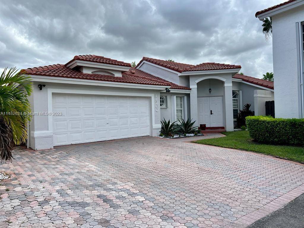 Welcome to this stunning single family home one floor in the prestigious Doral Isles community.