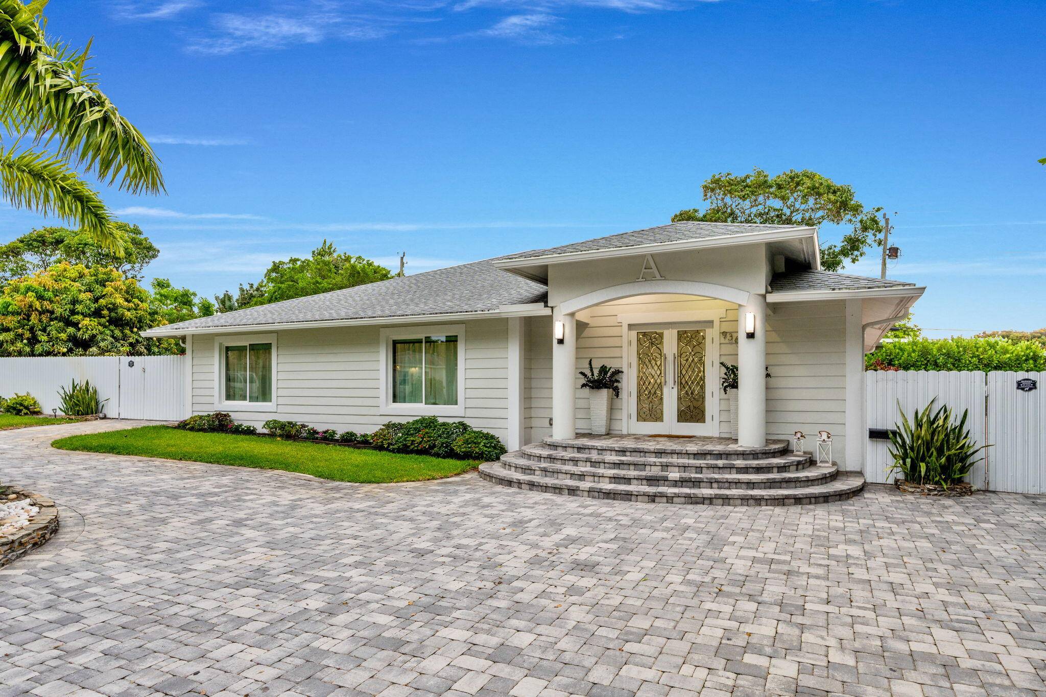 Step into your own private paradise with this exquisitely renovated 5 bedroom, 4.