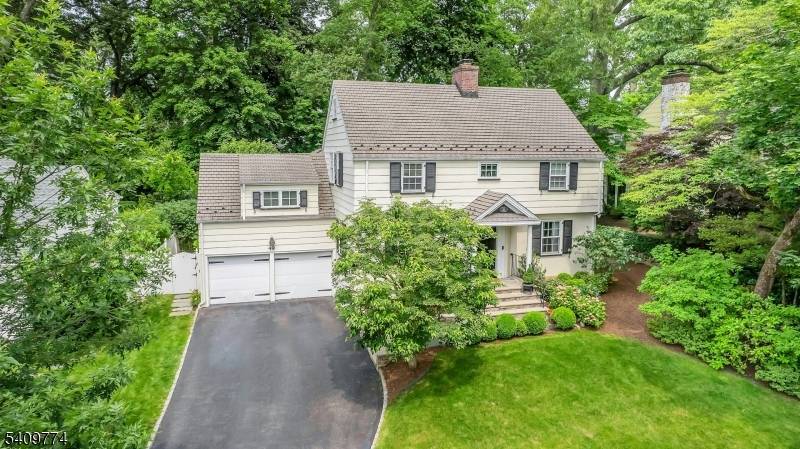 Welcome to 49 Norwood Avenue, a beautifully maintained colonial offering space, flexibility, and an exceptional Summit location.