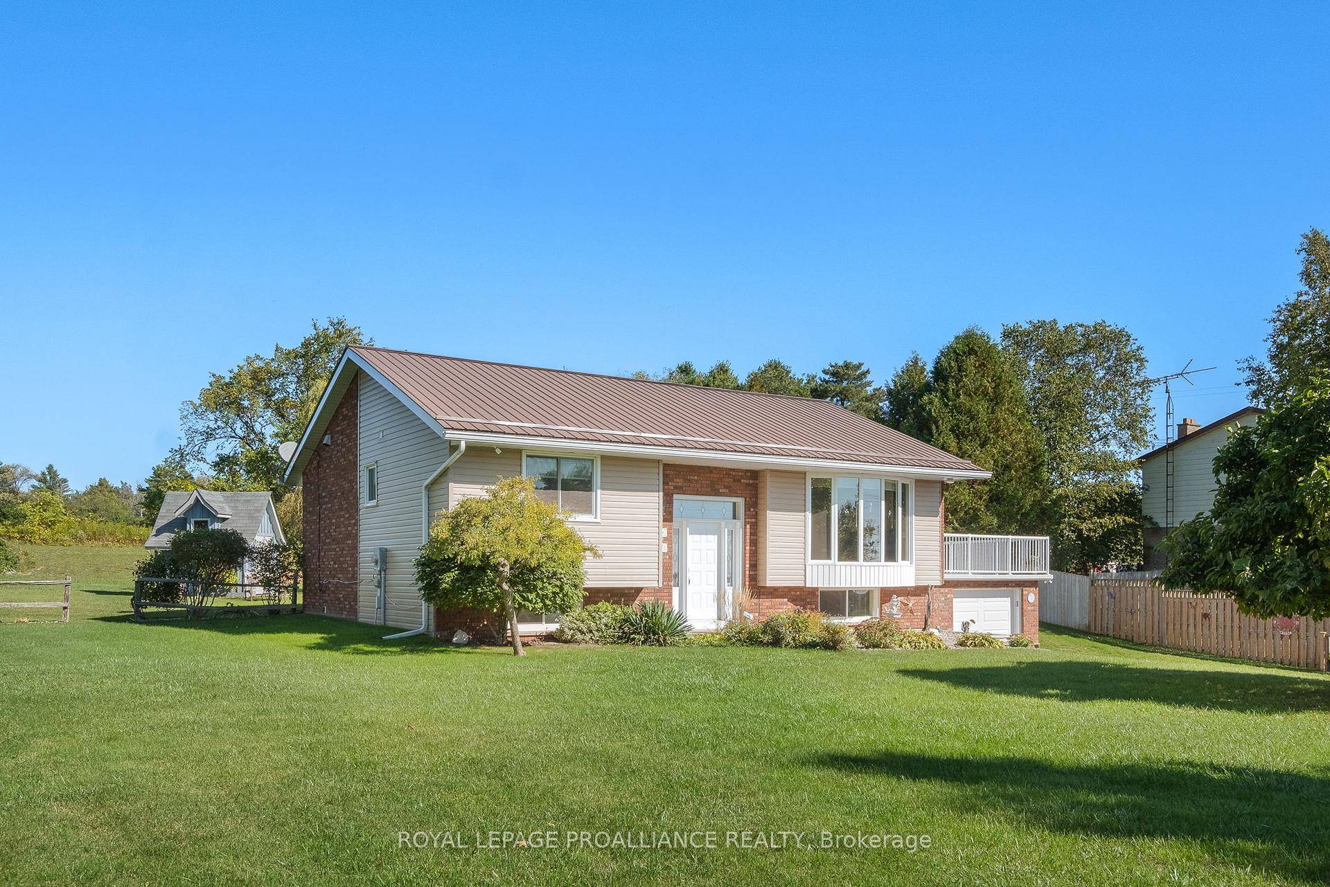 Welcome to this meticulously maintained raised bungalow situated on a private and beautifully landscaped 0.