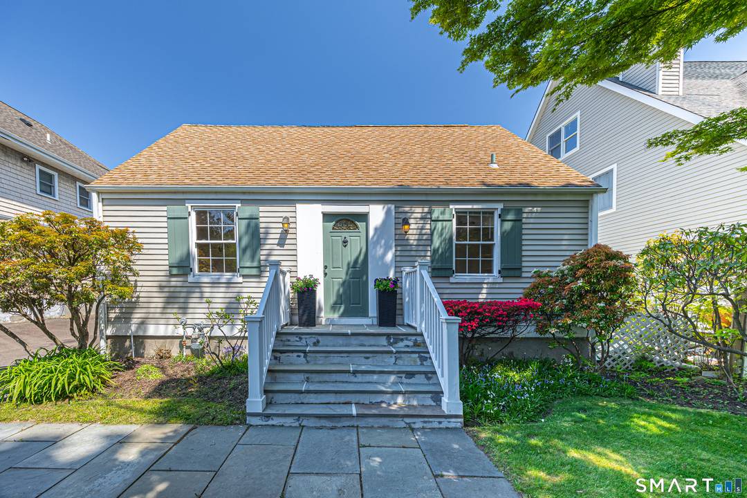 Charming beach area Cape home just over the Old Greenwich line in the Private Davenport Point Waterfront Assoc.
